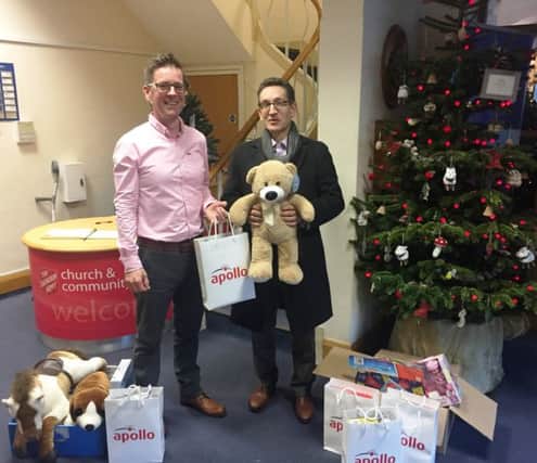 Apollo managing director Steve Brown, and Rob Warburton, community centre manager for The Haven at the Christmas gift presentation