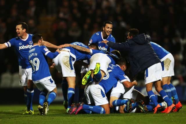 We have a football signed by Pompey's players to give away. Picture: Joe Pepler