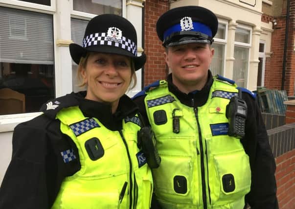 Sgt Janine Sanger and PCSO Sam Foster out visiting victims of burglaries in Portsmouth