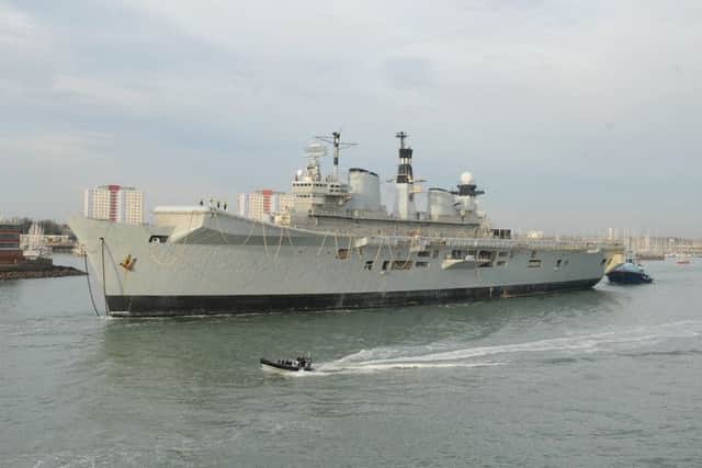 The former HMS Illustrious leaving Portsmouth for the final time Picture: Sarah Standing (161622-8242)