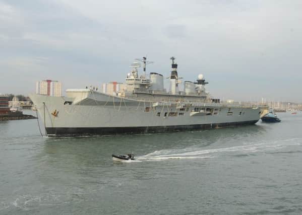 The former HMS Illustrious leaving Portsmouth for the final time Picture: Sarah Standing (161622-8242)