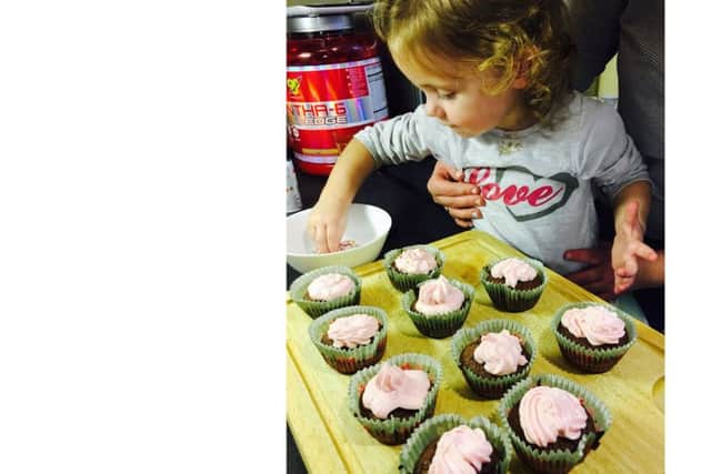 Pola Jedrysiak, two, who made cupcakes for people in Baffins, Portsmouth