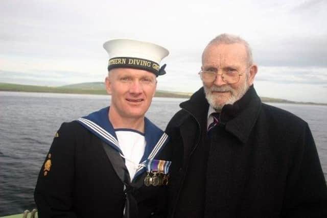 Arthur Smith with Ginge Pullen a member of the Faslane diving group. PPP-161228-173049001