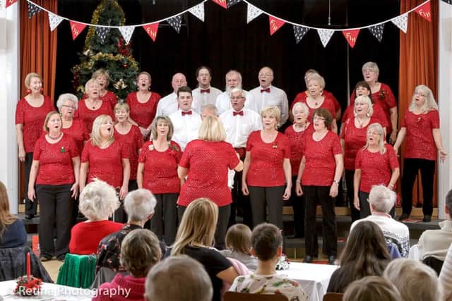 Folks in Harmony performing at Bedhampton Social Hall for the Red Cross