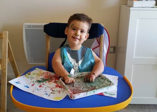Ezra Putineanu, aged 23 months from Southsea, received a new specialised buggy thanks to charity Newlife