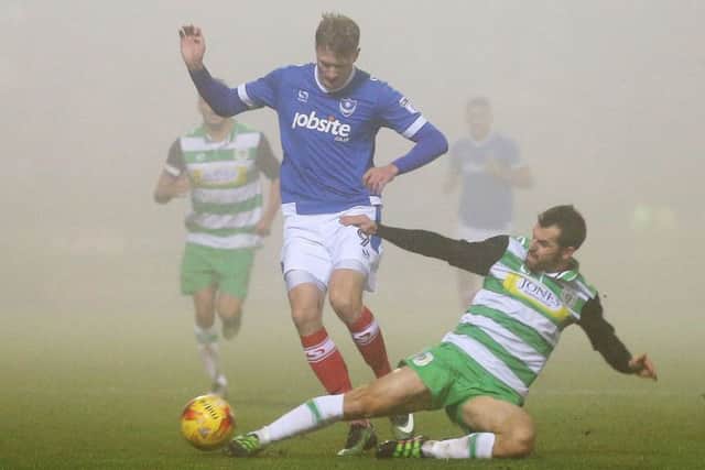 Michael Smith is challenged in the fog at Yeovil. Picture: Joe Pepler