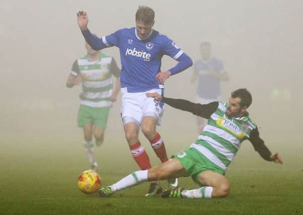 Michael Smith is challenged in the fog at Yeovil. Picture: Joe Pepler