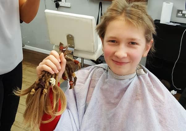 Stanislaw Romanski, 12, had his hair cut at M Cutting in Kingston Road, Portsmouth