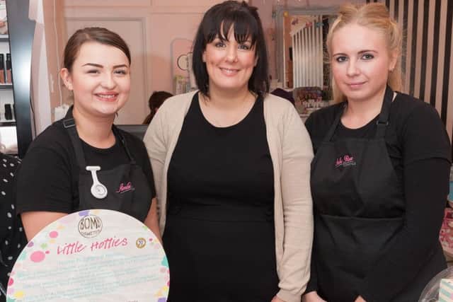 Amelie Rose Cosmetics shop owner Lucie A'Bear, centre, with Olivia Bowden, left, and Olivia Mullineaux, right. Picture: Keith Woodland (161578-004)