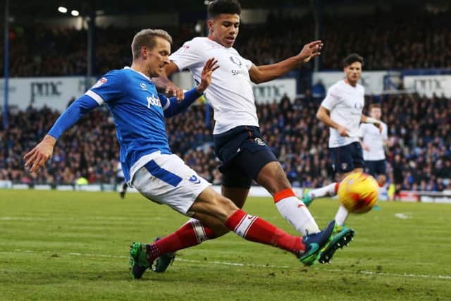 Carl Baker in action for Pompey during today's victory against Luton Picture: Joe Pepler