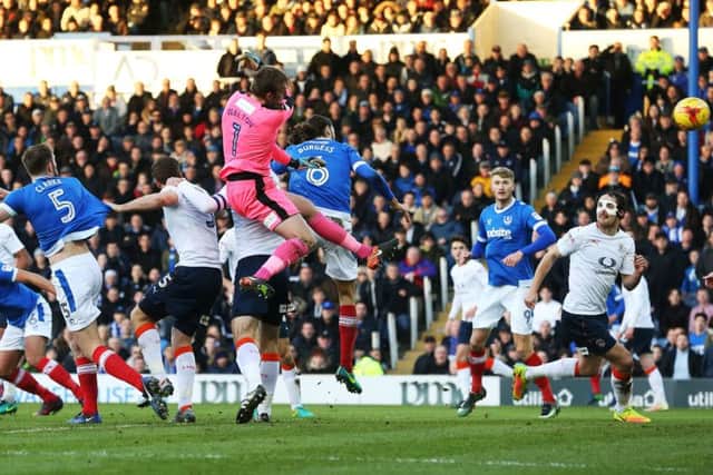 Christian Burgess scores with a header in the first half Picture: Joe Pepler
