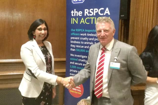 Fareham MP Suella Fernandes with Jeremy Cooper, chief executive of the RSPCA, in Westminster