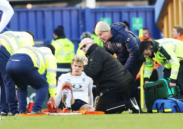 Luton midfielder Cameron McGeehan suffered a broken leg at Fratton Park on Monday Picture: Joe Pepler