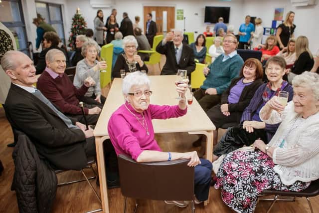 Visitors to the Jubilee Centre toast the makeover