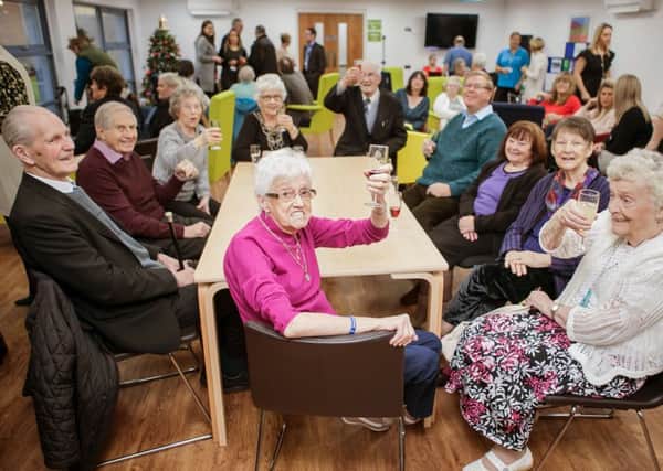 Visitors to the Jubilee Centre toast the makeover