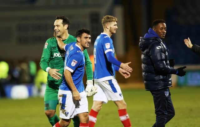 Pompey players celebrate victory over Luton   Picture: Joe Pepler