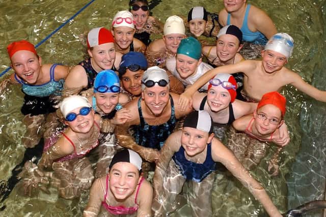 Former world champion Katy Sexton joins the 7th Cosham Girl Guides on their 1,700 length swim of Springfield School Pool in 2003