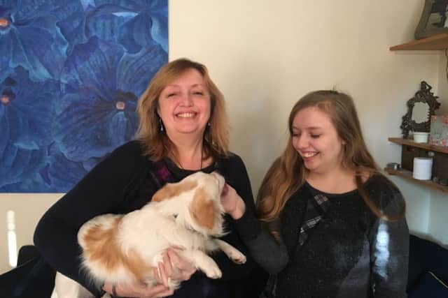 Lia Payne, 17, with her mother Sally Payne and their pet dog Pablo