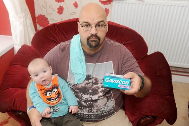 Pete Rigden is furious after Queen Alexandra Hospital's pharmacy gave out-of-date Gaviscon Infant for his son Charlie  Picture: Sarah Standing (161704-9260)