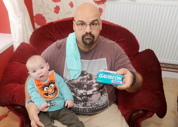 Pete Rigden is furious after Queen Alexandra Hospital's pharmacy gave out-of-date Gaviscon Infant for his son Charlie  

Picture: Sarah Standing (161704-9260)