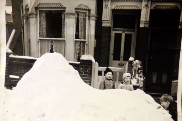 BIG DRAW Children came from surrounding streets to sample Alan Marshs igloo in Sheffield Road, Fratton