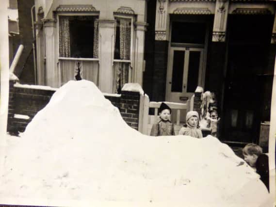 BIG DRAW Children came from surrounding streets to sample Alan Marshs igloo in Sheffield Road, Fratton