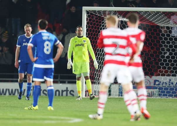 Pompey recovered well from a poor start only to concede twice more and lose 3-1 at Doncaster. Picture: Joe Pepler