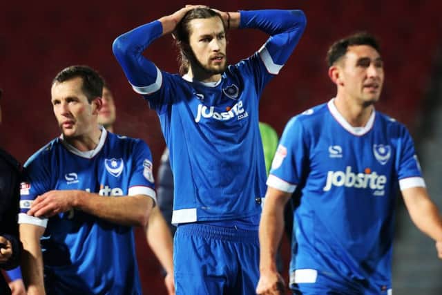 The Pompey players at the final whistle at the Keepmoat Stadium Picture: Joe Pepler