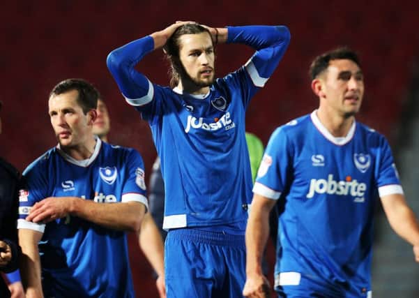 The Pompey players at the final whistle at the Keepmoat Stadium Picture: Joe Pepler