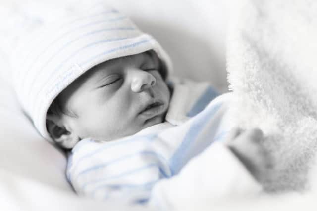 File picture of a sleeping baby boy