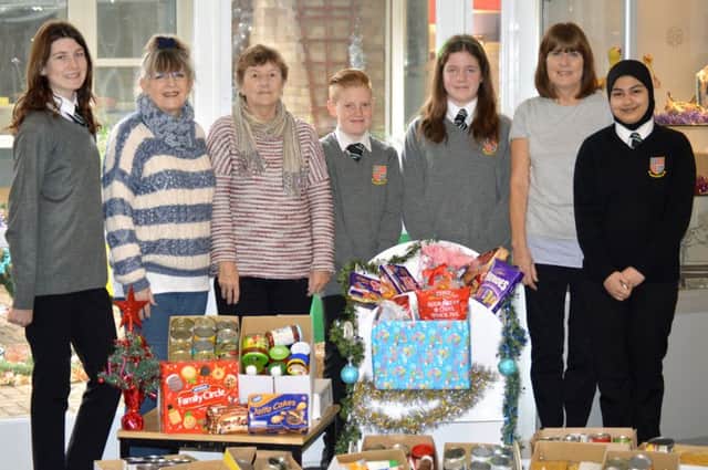 Pupils from Brune Park donate food to FISH volunteers