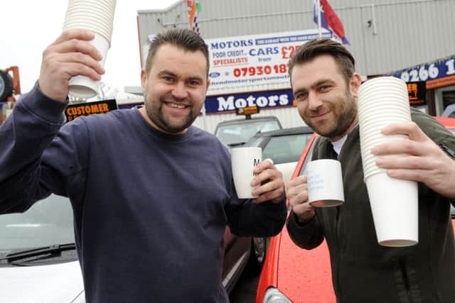 Danny O'Reilly, 38, left and Tony Clemnents, 30, of North End Motors in London Road North End, Portsmouth 
Picture:  Malcolm Wells (170109-4547)