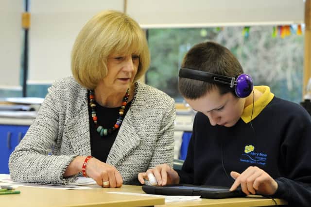 Executive headteacher Alison Beane with pupil Jacob Ives, 13, at the Mary Rose Academy Picture: Malcolm Wells (170109-9392)