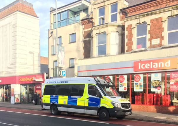 Police at Iceland, London Road, North End, Portsmouth. Picture: Habibur Rahman.