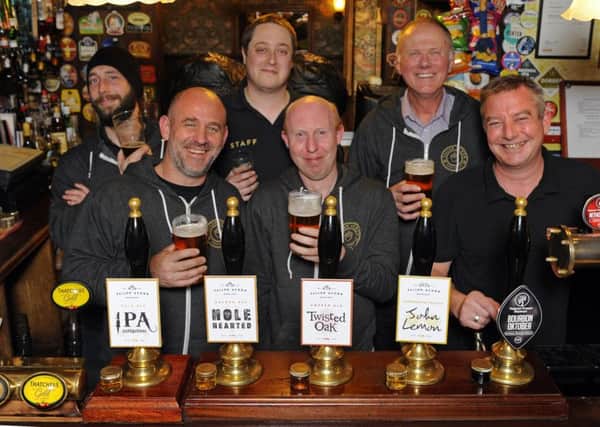 (L-r) Assistant brewer Miki Van der Walt, head brewer Ed Anderson, MD Matt Curd, drayman Chris Tiller, sales account manager Andrew Poole and Hole in The Wall manager Tony Durrant   Picture by:  Malcolm Wells