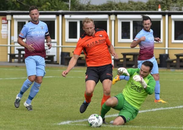 AFC Portchester striker Andy Todd dumped former club Petersfield out of the Russell-Cotes Cup   Picture: Neil Marshall