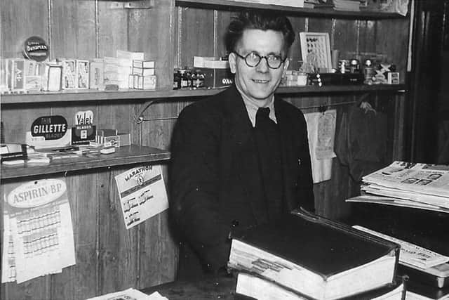 Anne Stockham's father in the family shop, Sewards