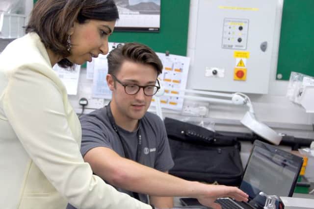 Fareham MP Suella Fernandes with a Saab Seaeye apprentice