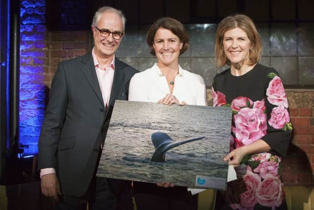 Susie Tomson from Land Rover BAR, with Charles Clover, left, and Sacha Bonsor