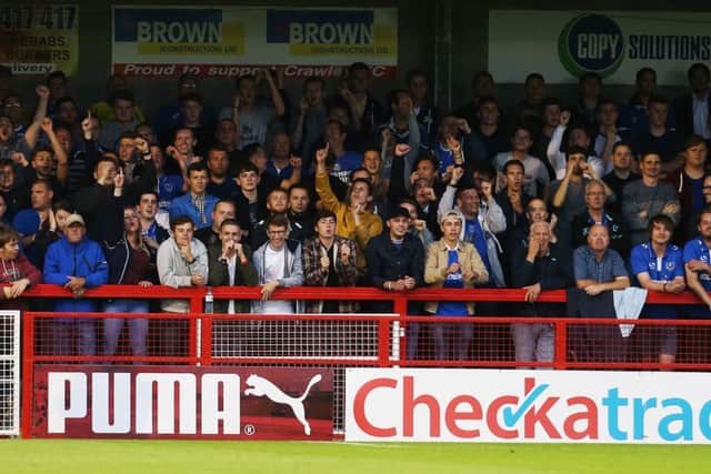 Pompey fans during the last visit to the Broadfield Stadium. Picture: Joe Pepler