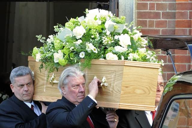 The coffin of renowned architect Hedley Greentree leaves St Faith's Church in Lee-on-the-Solent
Picture: Malcolm Wells (170111-9573)