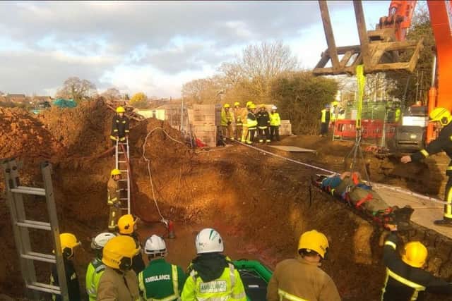 Firefighters and paramedics rescued a man who fell in a hole in Swanmore   PHOTO: Scas