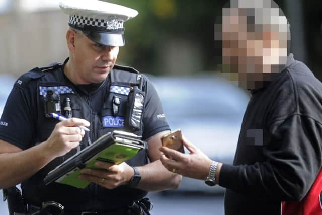 File photo of roads policing officer PC Mark Fruin after catching a driver using a mobile phone in Portsmouth. Picture: Ian Hargreaves