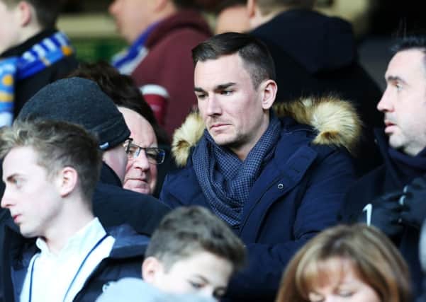 Jed Wallace watching Pompey's 1-0 win over Luton at Fratton Park earlier this month    Picture: Joe Pepler
