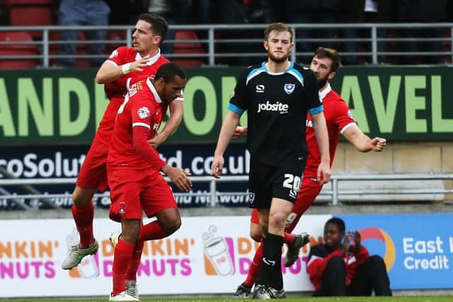 Jay Simpson celebrates scoring against Pompey last season Picture: Joe Pepler