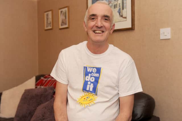 Glenn Nicholls, 53, from Cosham, abseiled down the Spinnaker Tower in August, raising money for Wave 105's Cash For Kids 1,000 Faces campaign Picture: Sarah Standing (170044-683)