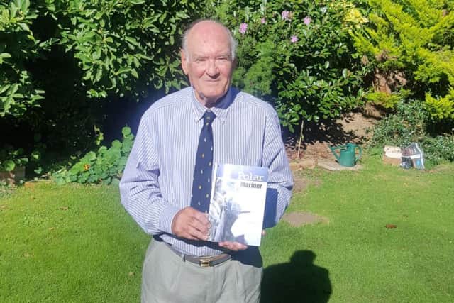 Captain Tom Woodfield with his book Polar Mariner: Beyond the Limits in Antarctica
Picture: Will Rooney