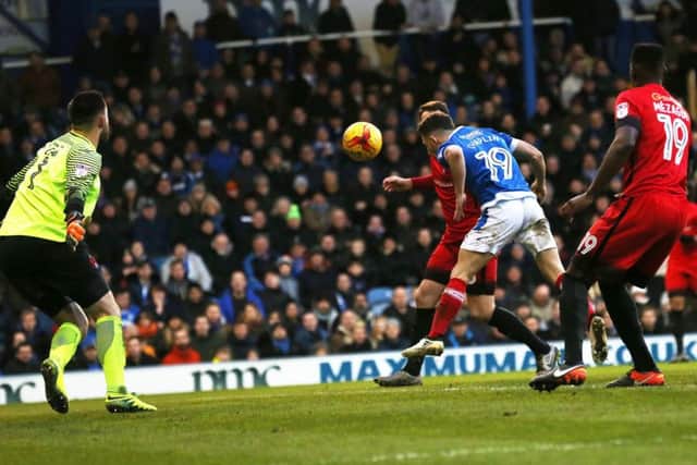 Conor Chaplin scores the second of his two goals against Leyton Orient Picture: Joe Pepler