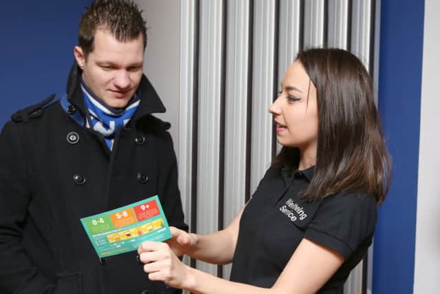 Dan Churchley talking to Wellbeing worker Sophie Dean
