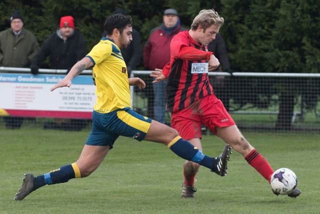 Fareham Town's Simon Woods and Curtis Da Costa of Moneyfields, left, were both on target in the derby. Picture: Keith Woodland (170082-0390)